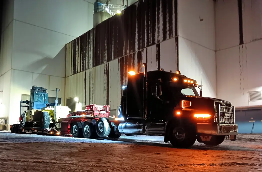Freight trucks at Alaska logistics terminal