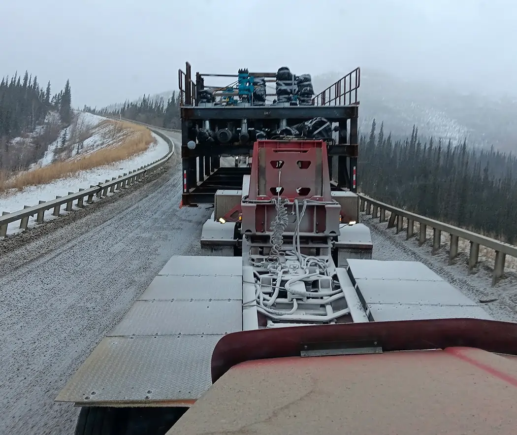 Truck driving on Alaska highway